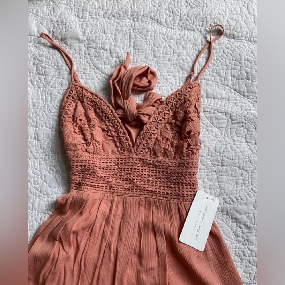 BRAND NEW romper never worn tags on